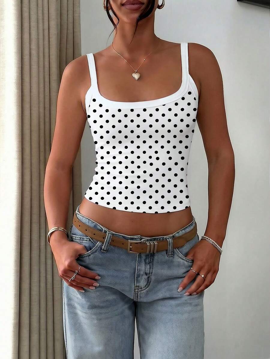 A slim fit women's crop cami tank top with spaghetti straps and a solid color design, made from comfortable stretch knitted fabric.