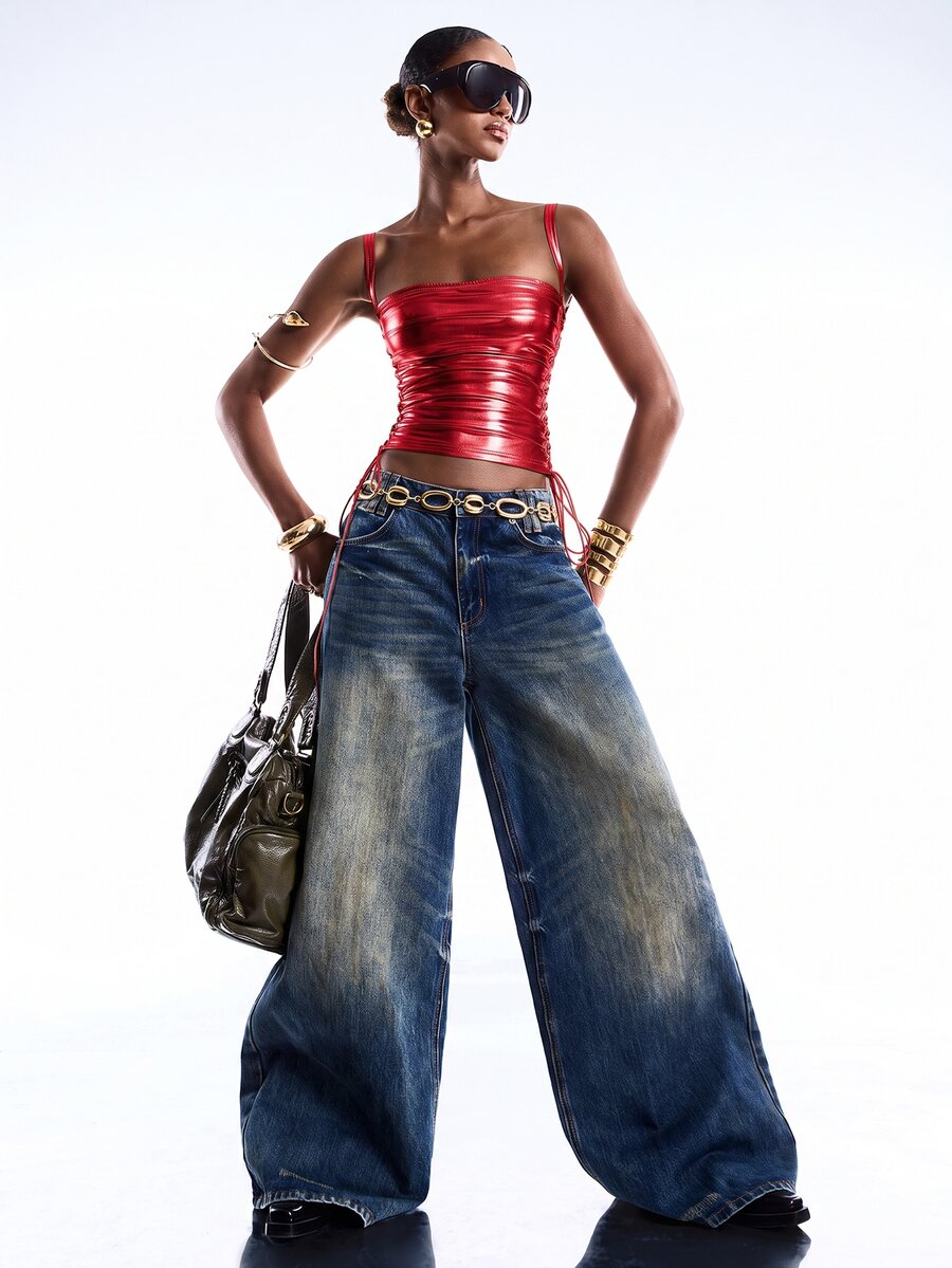 Black PU leather cropped camisole top for women featuring spaghetti straps, side tie details, and a ruched slim fit.
