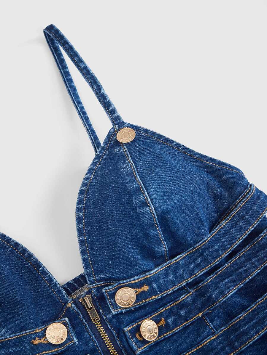 Women's blue fitted denim camisole top featuring metal buckle details, ruched cup design, zipper placket, and thin spaghetti straps.