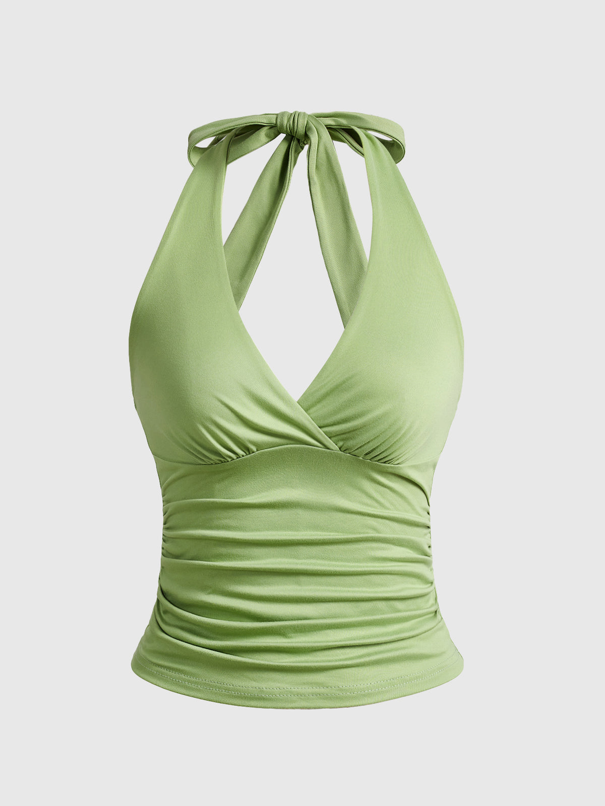 Women's halter crop tank top featuring a backless silhouette and ruched detailing in a slim fit design.