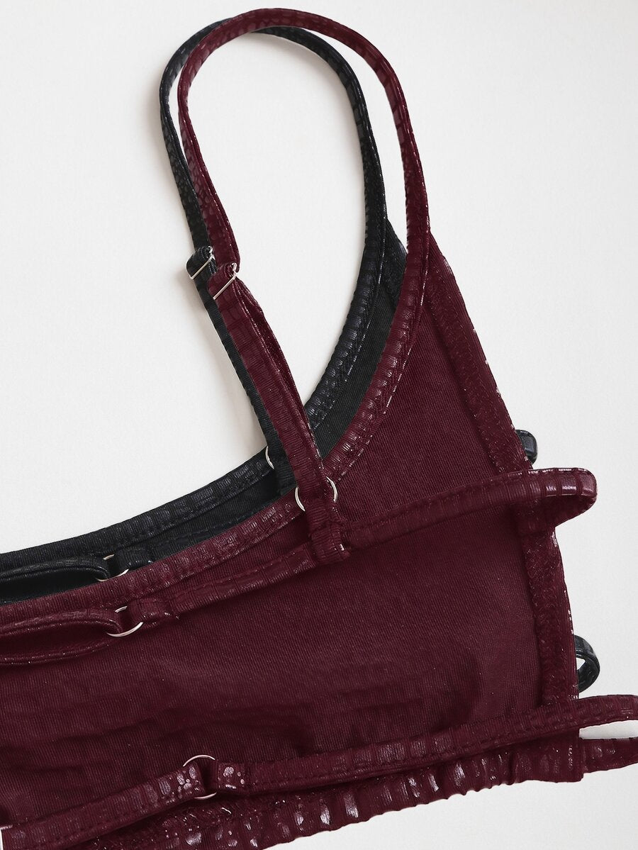 Women's black cropped camisole top with faux crocodile texture, backless spaghetti straps, and matching arm sleeves.