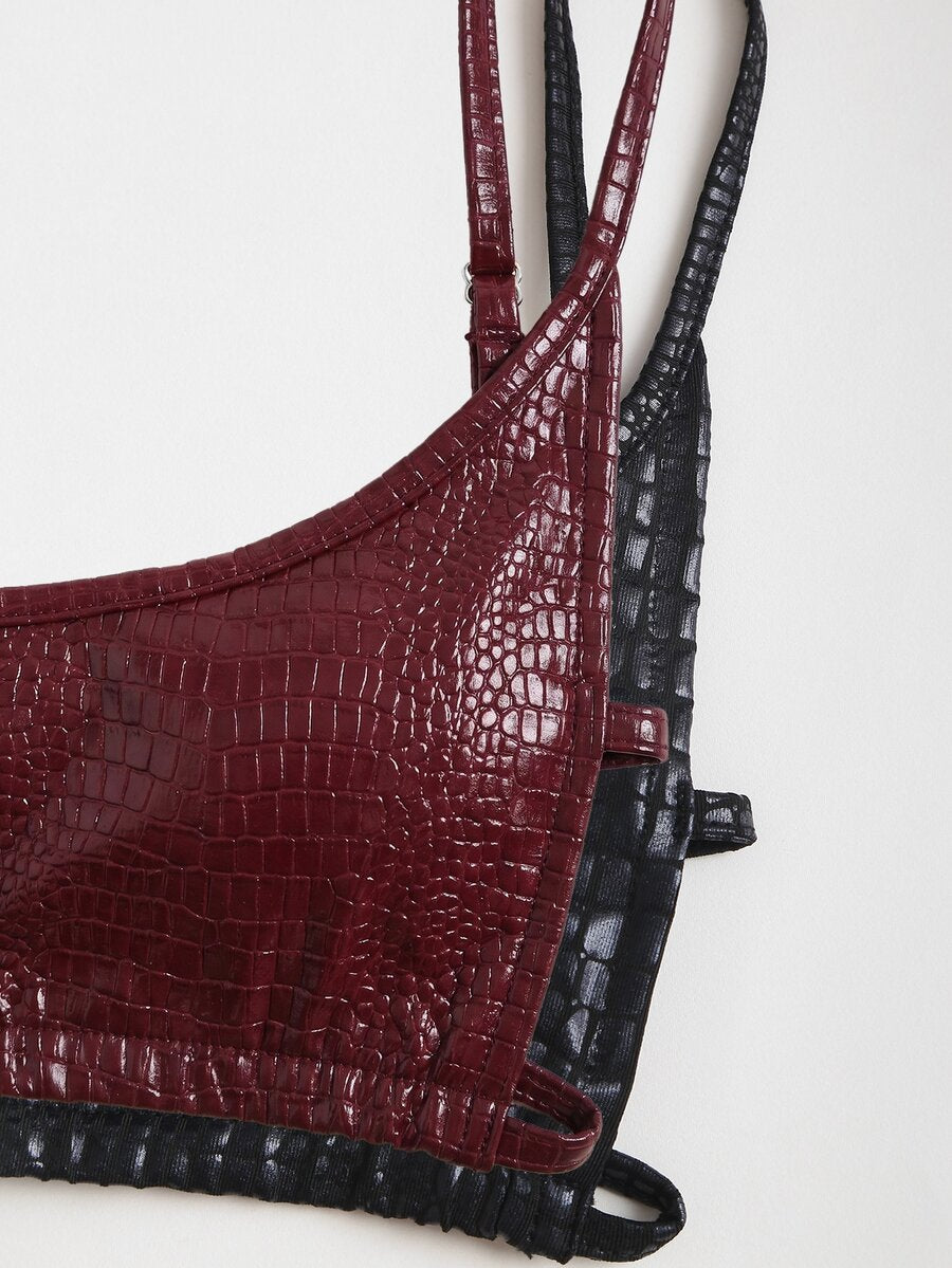 Women's black cropped camisole top with faux crocodile texture, backless spaghetti straps, and matching arm sleeves.