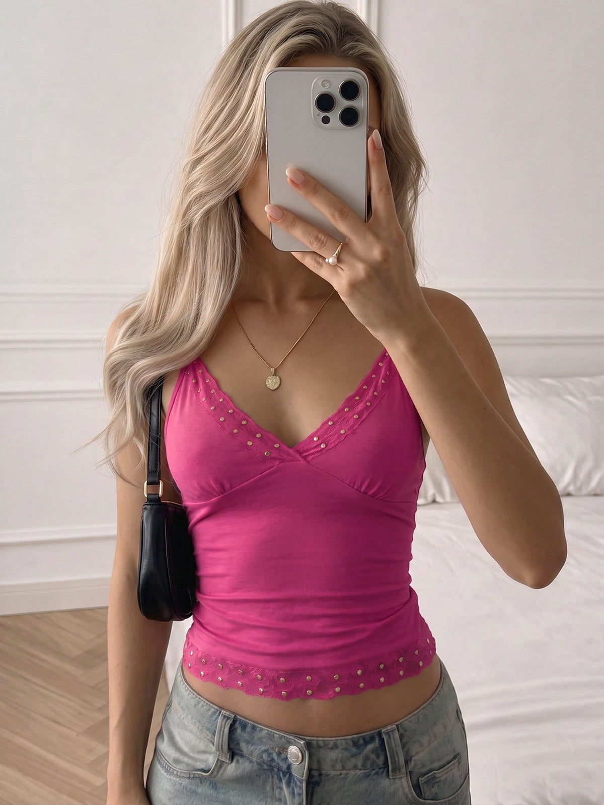 Women's deep V-neck camisole top featuring contrast hollow lace trim, cutout detail, and thin spaghetti straps.
