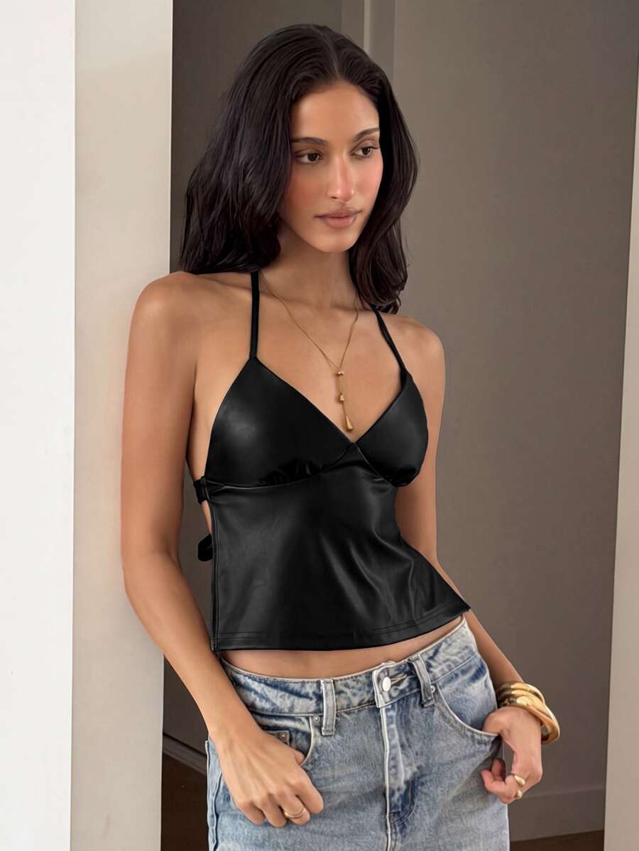 Women's black faux leather backless cami top with spaghetti straps and lace-up shirred sides.