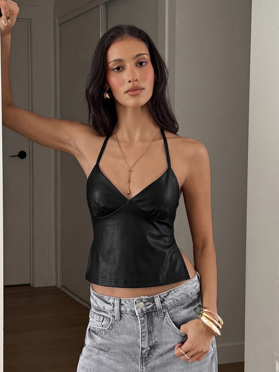 Women's black faux leather backless cami top with spaghetti straps and lace-up shirred sides.