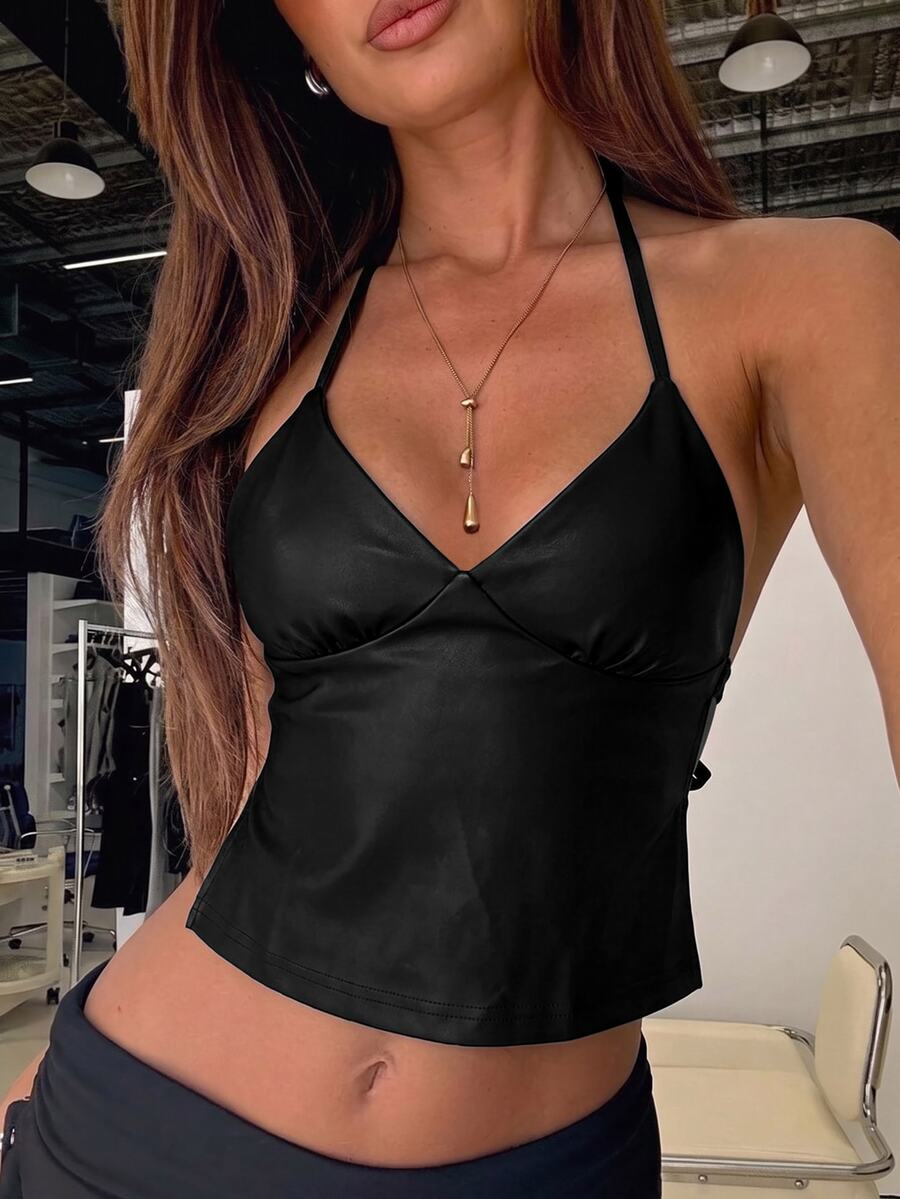 Women's black faux leather backless cami top with spaghetti straps and lace-up shirred sides.