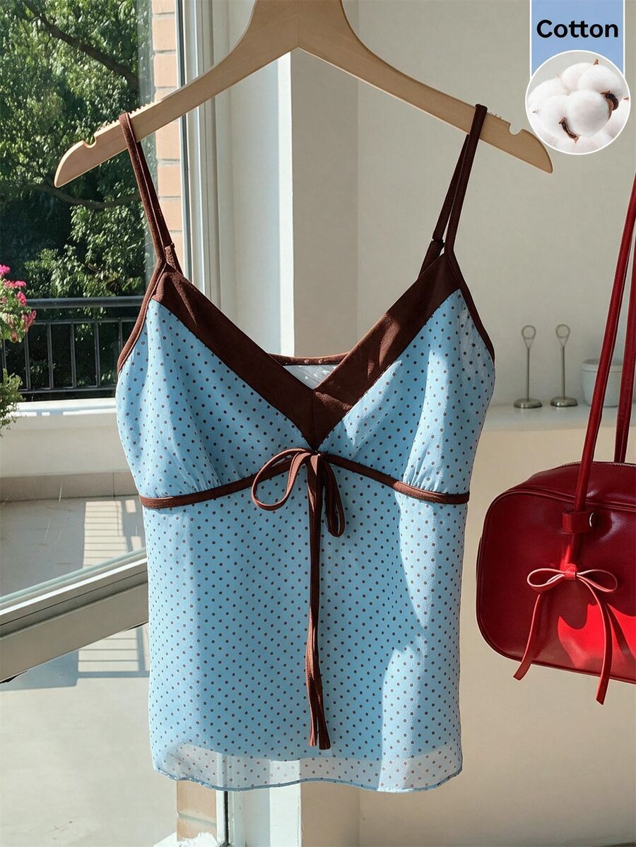 Black and white polka dot tie strap camisole top for women with thin spaghetti straps and slim fit.