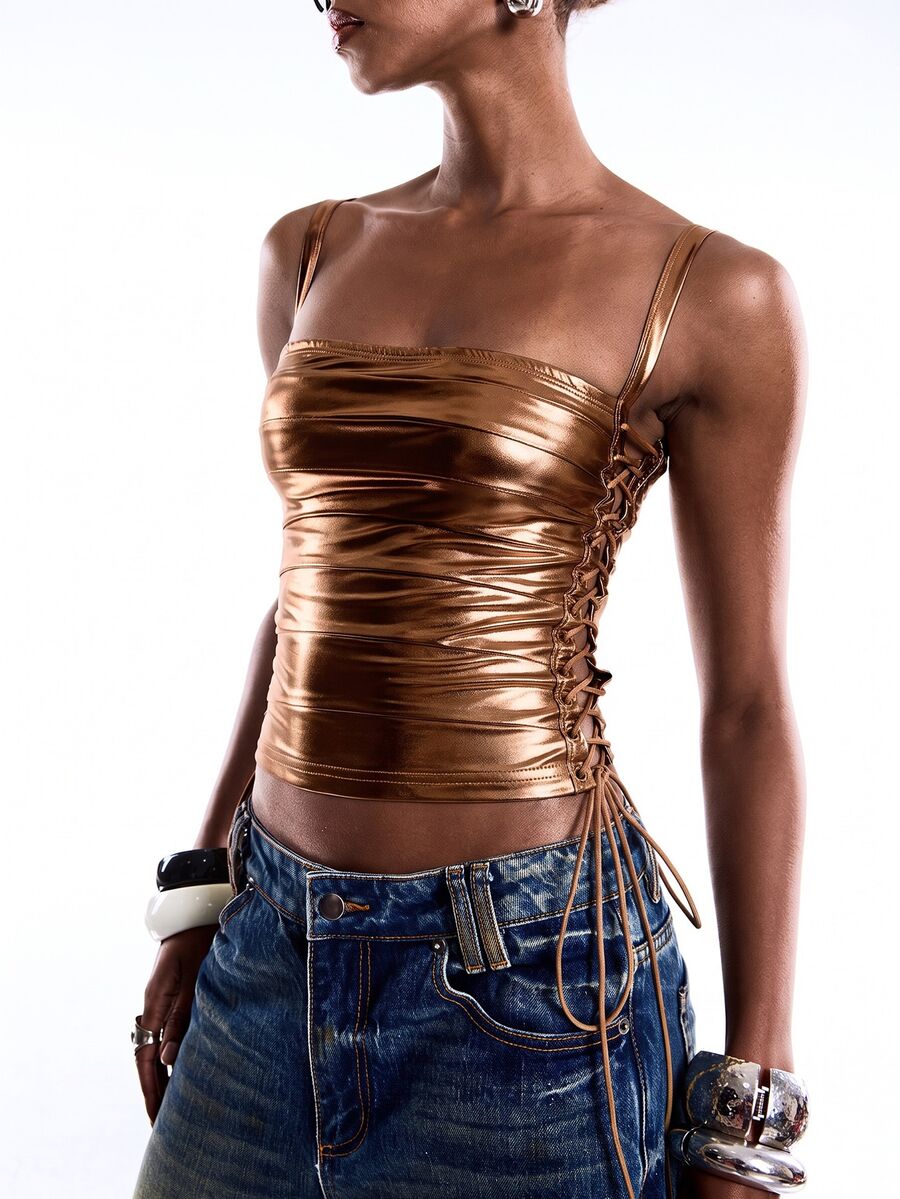 Black PU leather cropped camisole top for women featuring spaghetti straps, side tie details, and a ruched slim fit.