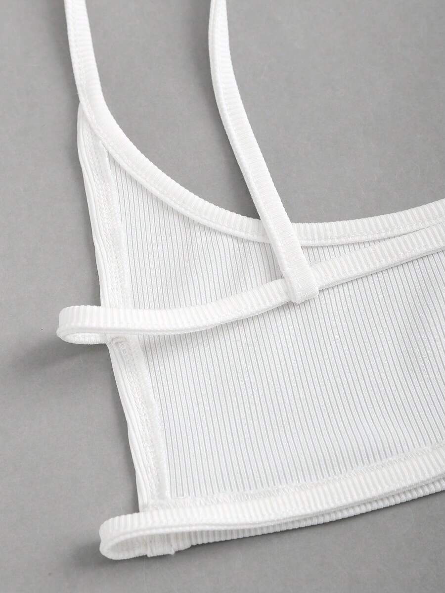 Women's black cropped camisole top with faux crocodile texture, backless spaghetti straps, and matching arm sleeves.