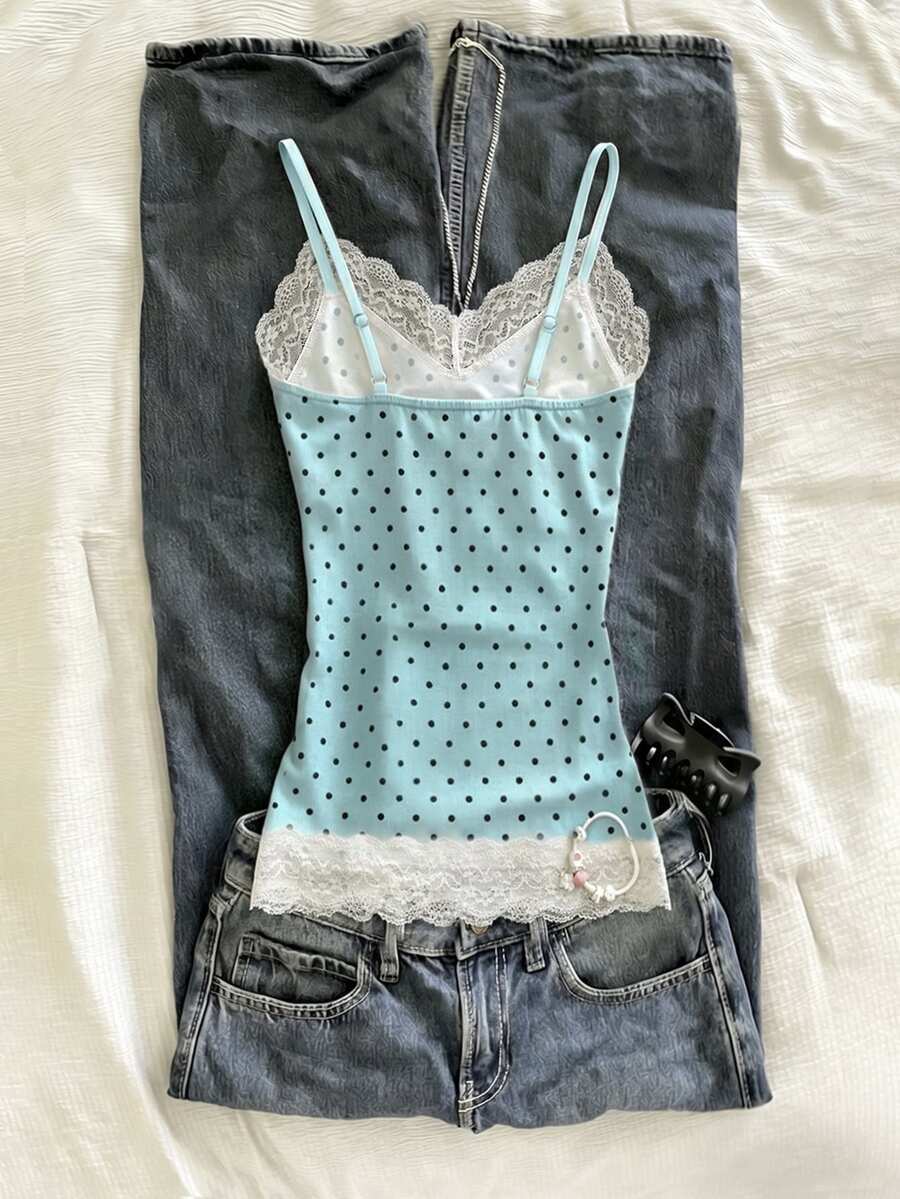Women's solid color slim fit camisole top featuring delicate lace patchwork embroidery and tank straps.