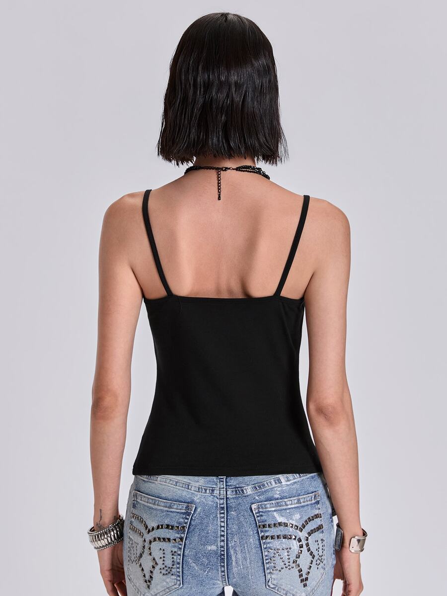 Black fitted cropped spaghetti strap tank top for women featuring a graphic portrait cross print with rhinestone details.