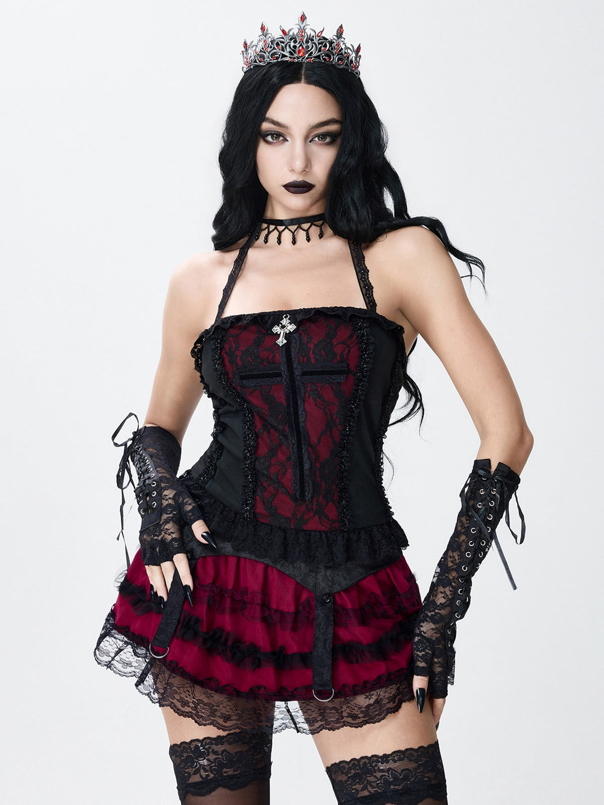 A women's gothic halter cami crop top featuring contrast lace patchwork, velvet fabric, backless knot detail, and slim fit.