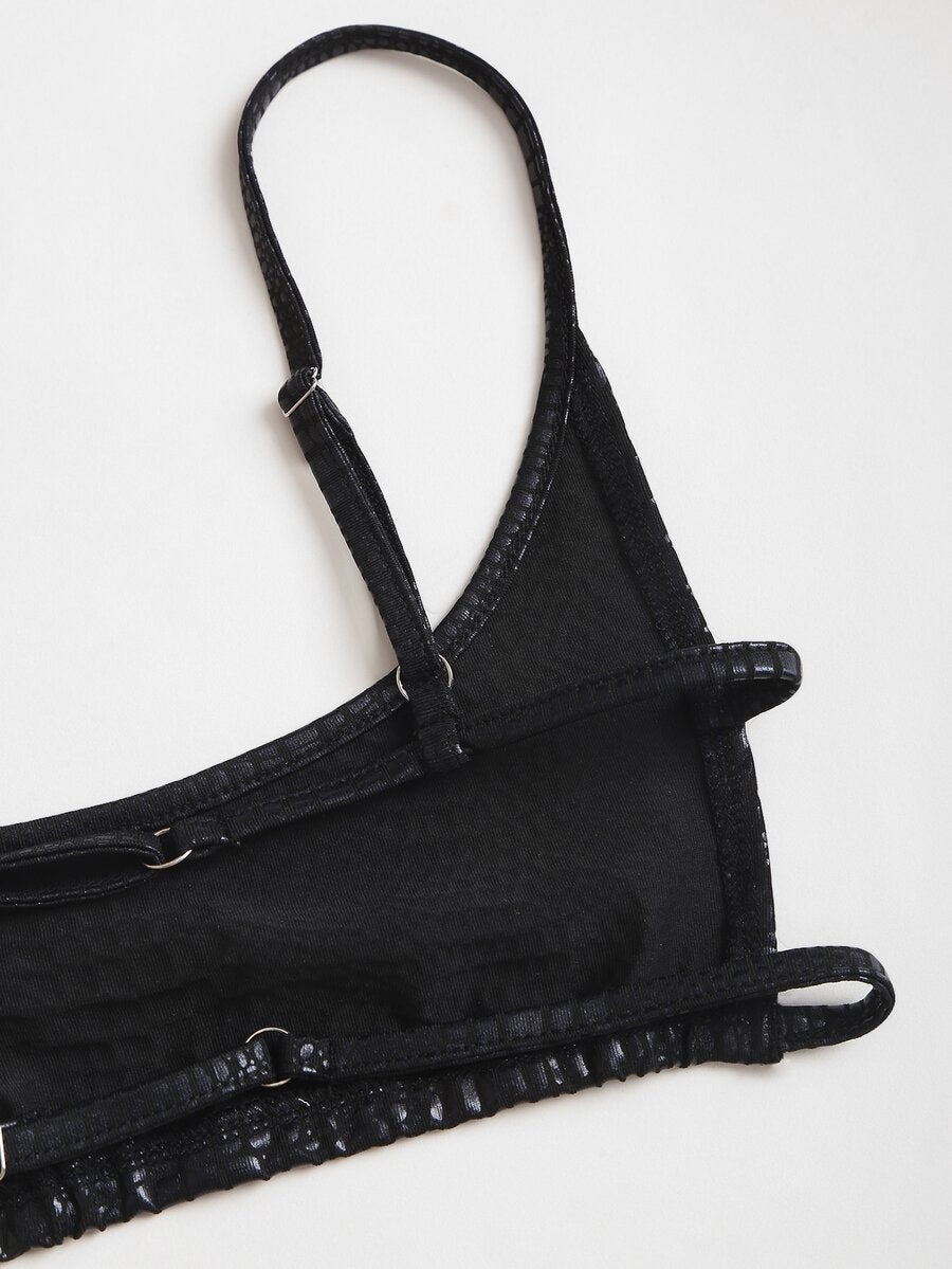 Women's black cropped camisole top with faux crocodile texture, backless spaghetti straps, and matching arm sleeves.