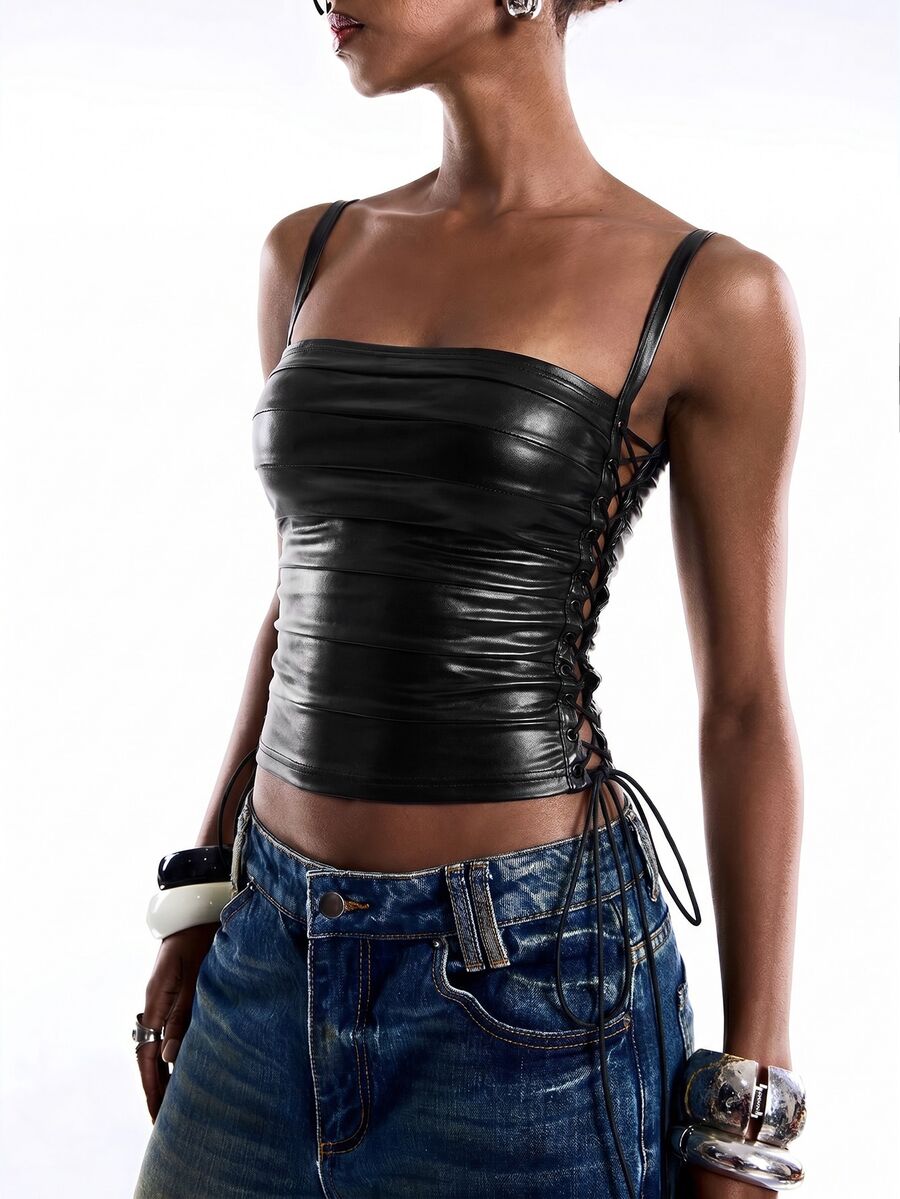 Black PU leather cropped camisole top for women featuring spaghetti straps, side tie details, and a ruched slim fit.
