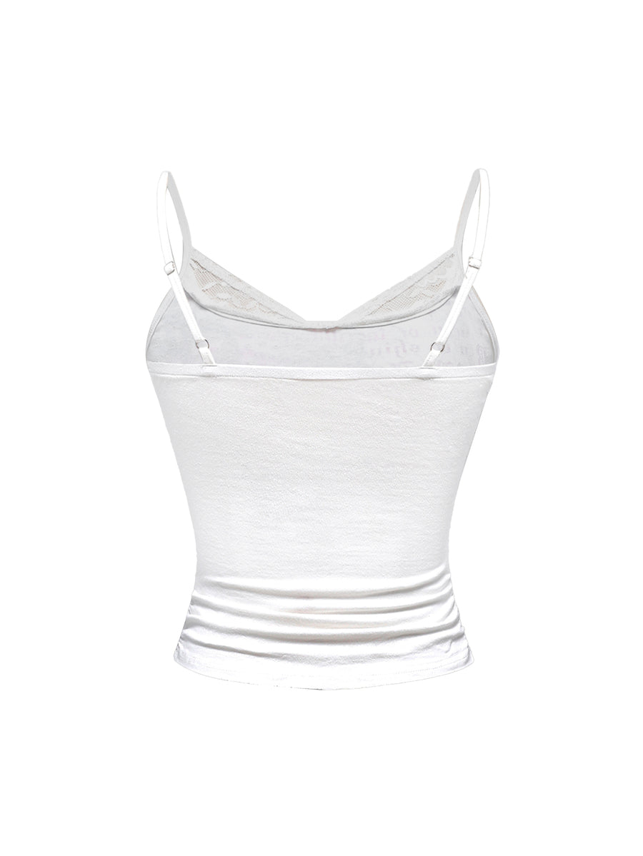Women's pink slim-fit cami top featuring spaghetti straps, ruched front detail, contrast lace trim, and rhinestone floral accents.