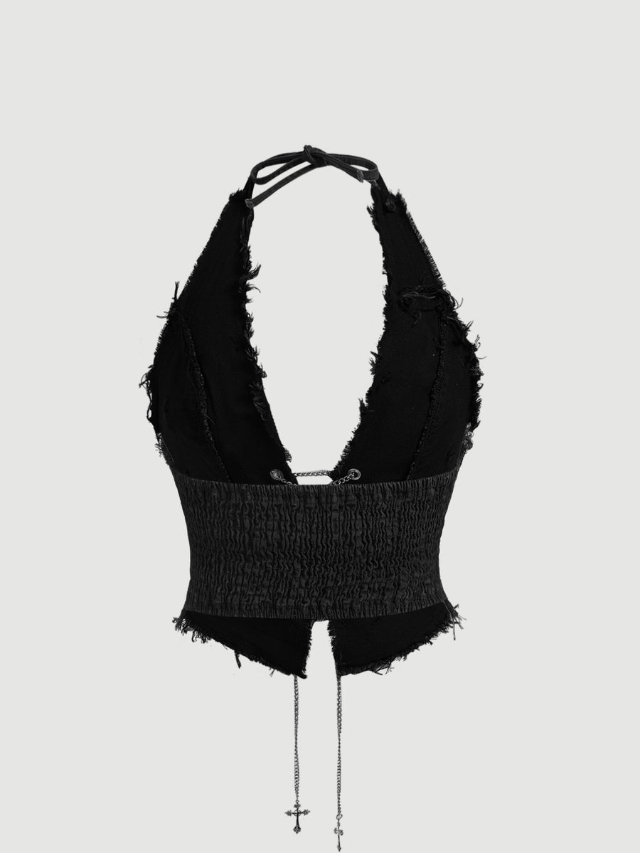 Black goth halter denim crop top featuring a backless cross lace-up design and asymmetrical hem on a model.