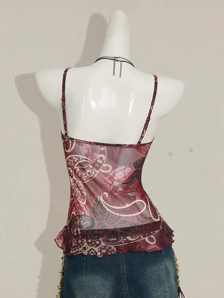 Women's burgundy floral graphic print mesh camisole top featuring an asymmetrical hem, backless cut, and spaghetti straps.