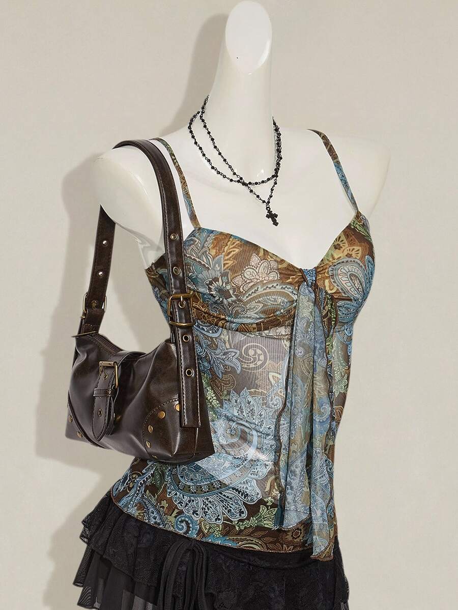 Burgundy paisley print ruched cami top for women featuring thin spaghetti straps, asymmetrical lace-up detail, and a slim fit.