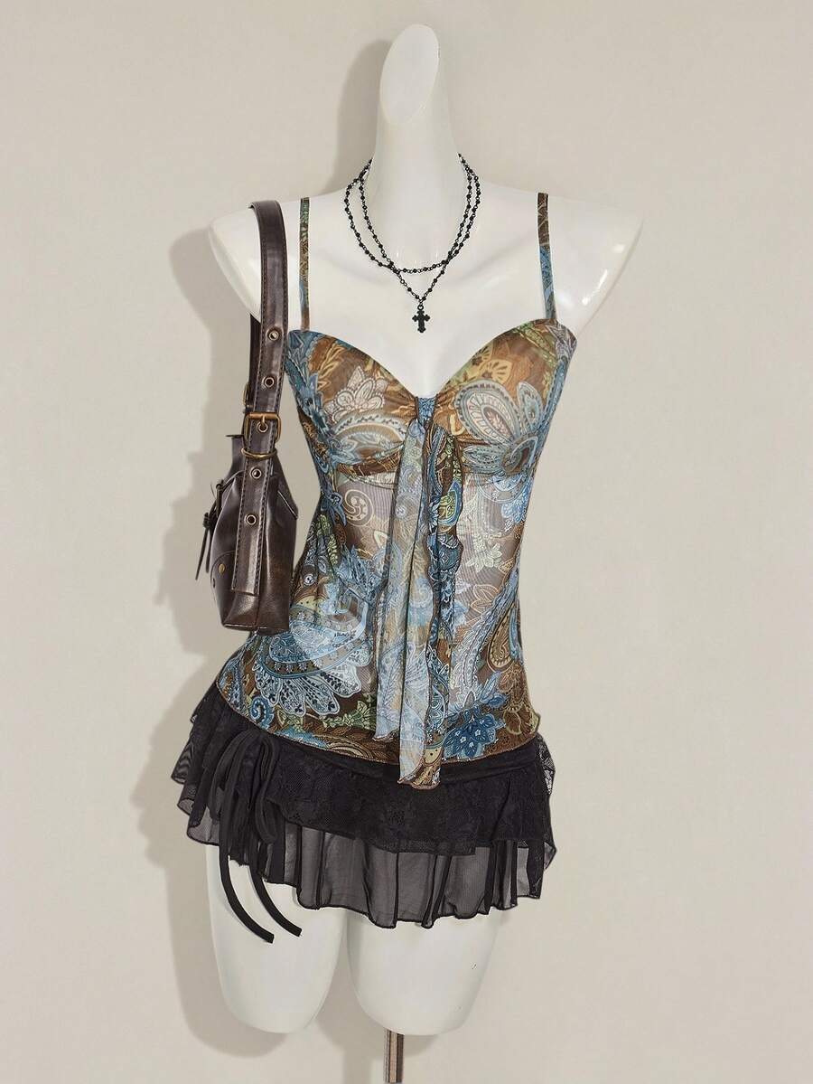 Burgundy paisley print ruched cami top for women featuring thin spaghetti straps, asymmetrical lace-up detail, and a slim fit.