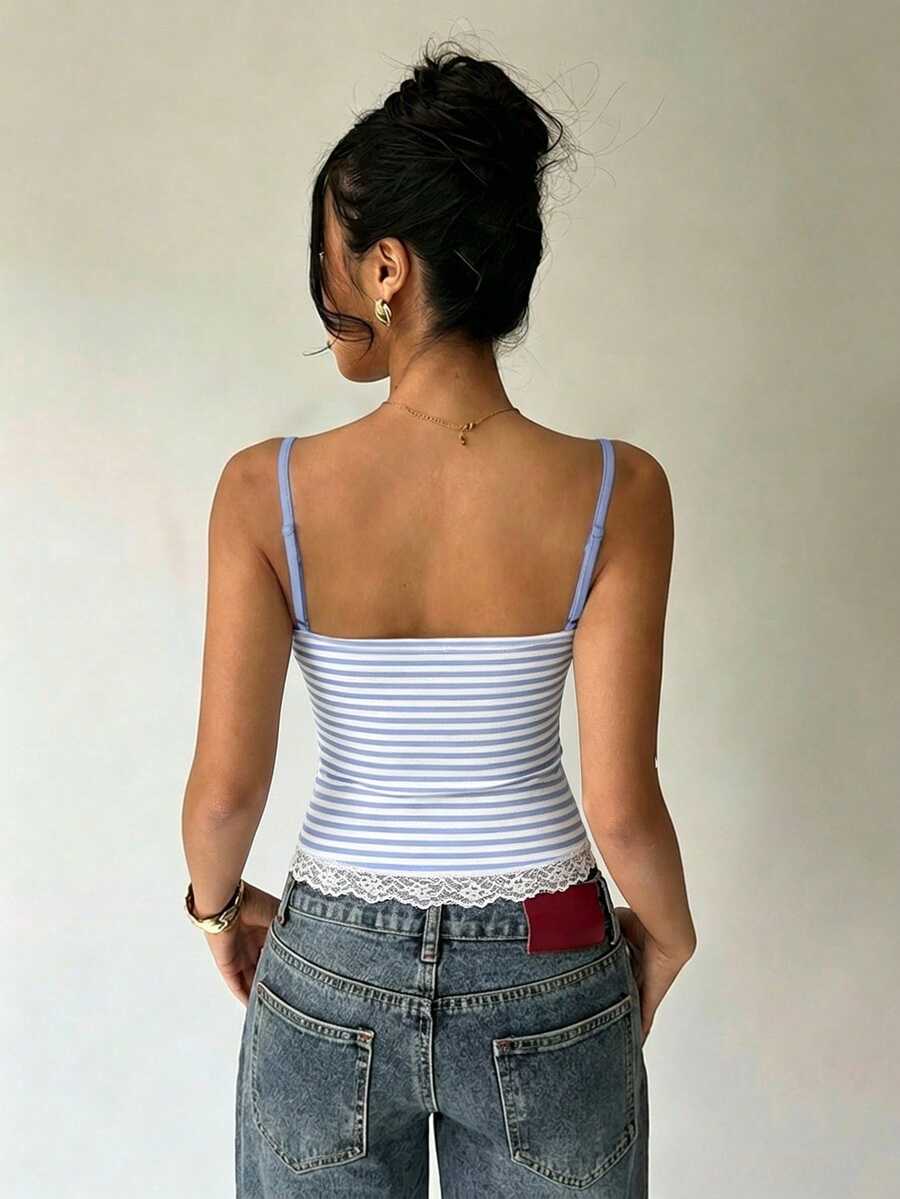 Women's blue and white striped camisole featuring white contrast lace patchwork, spaghetti straps, and a backless slim fit design.