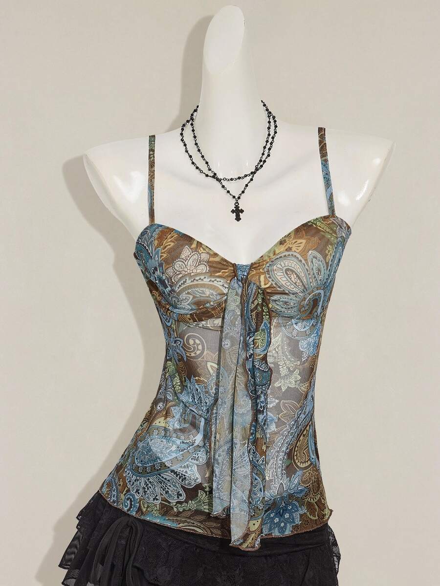Burgundy paisley print ruched cami top for women featuring thin spaghetti straps, asymmetrical lace-up detail, and a slim fit.
