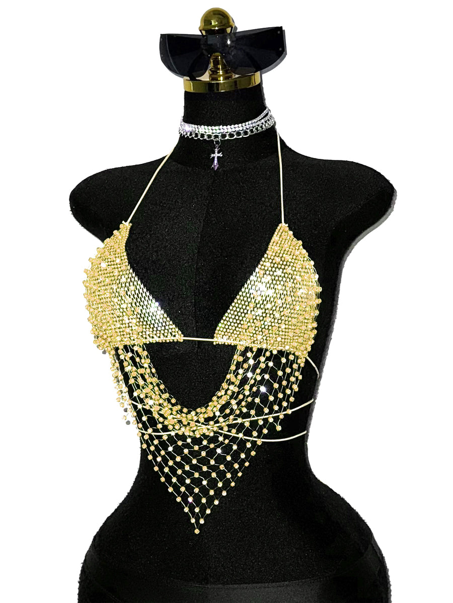 Black sheer mesh halter top for women featuring rhinestone glitter effect, backless design, chain details, and an asymmetrical hem.