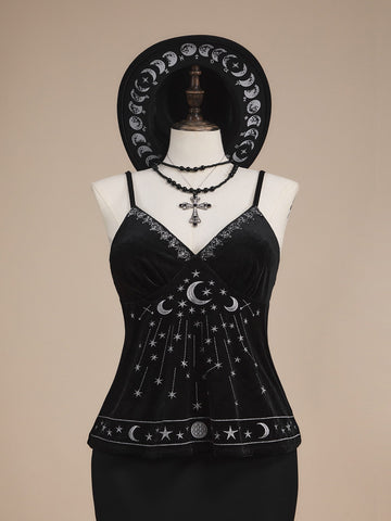 Black velvet camisole top featuring an astrology moon and star graphic print, spaghetti straps, and a backless lace-up design.