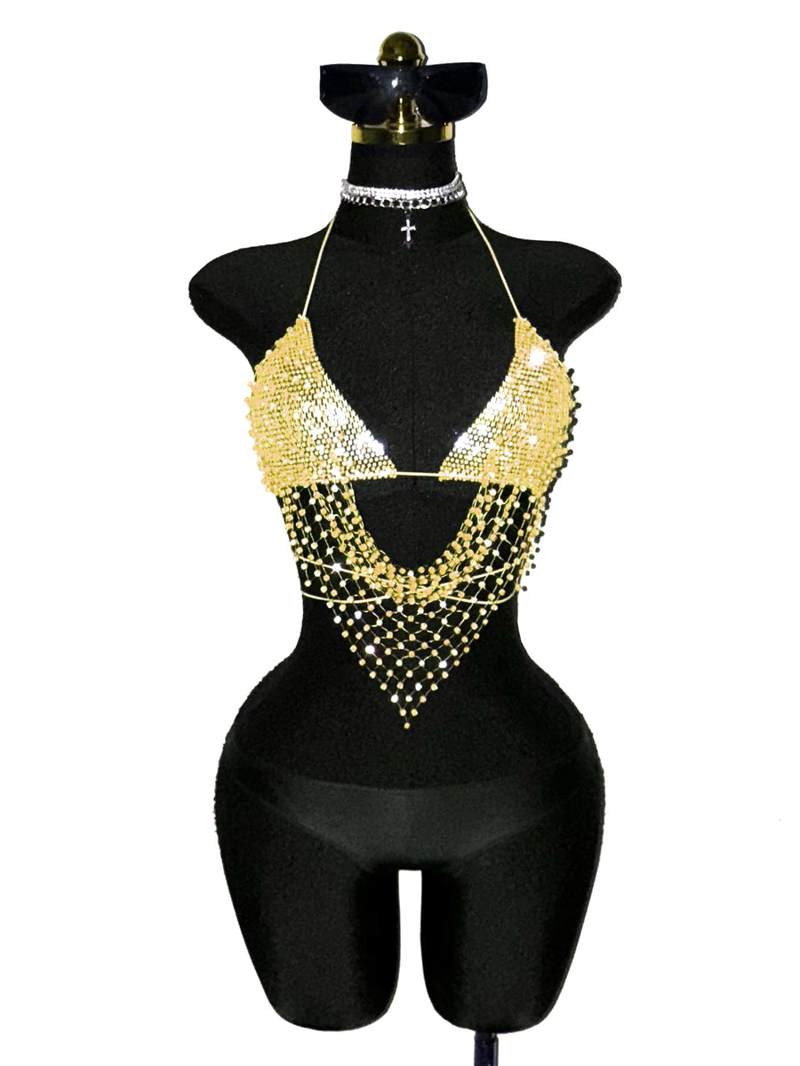 Black sheer mesh halter top for women featuring rhinestone glitter effect, backless design, chain details, and an asymmetrical hem.