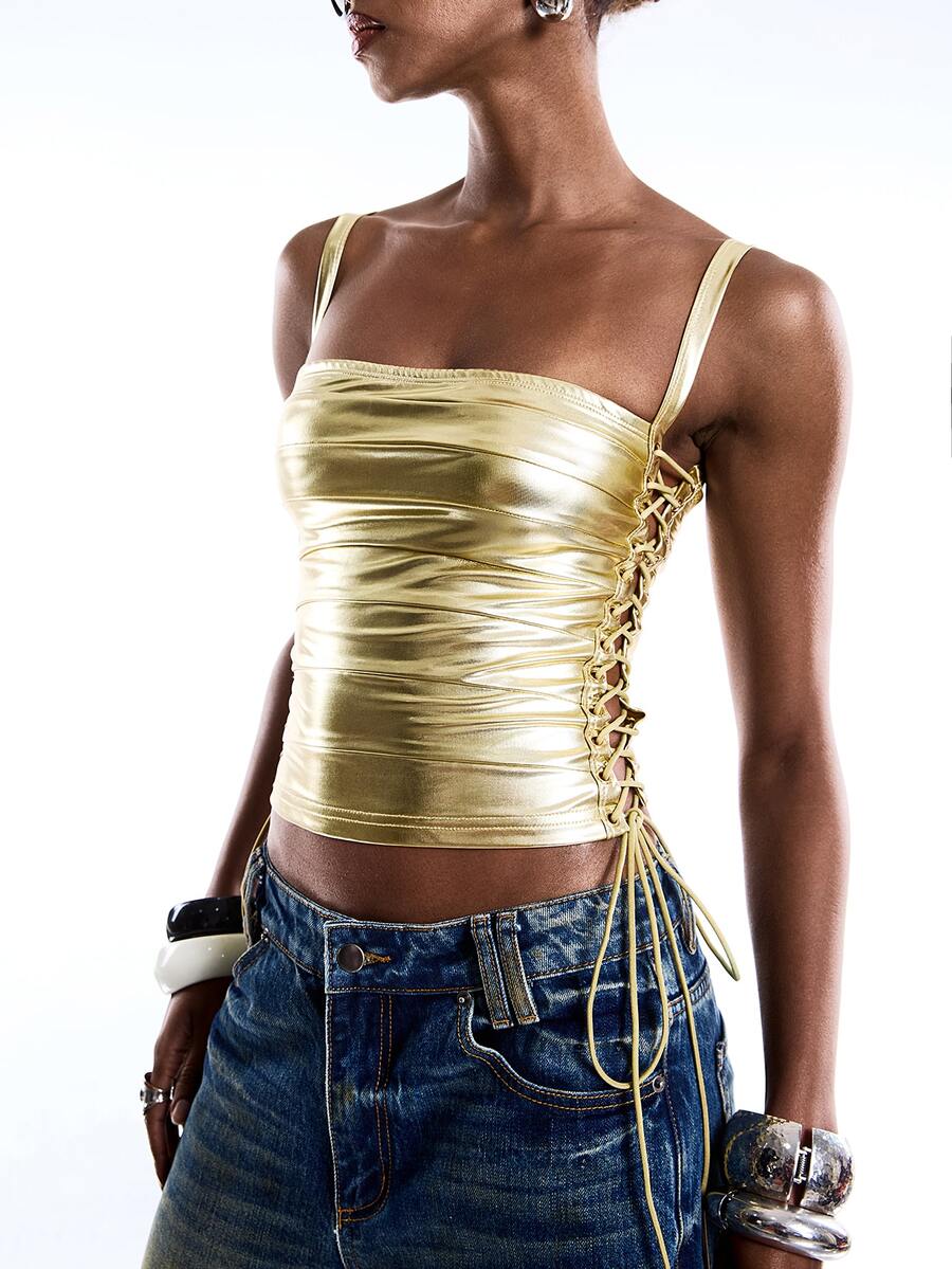 Black PU leather cropped camisole top for women featuring spaghetti straps, side tie details, and a ruched slim fit.