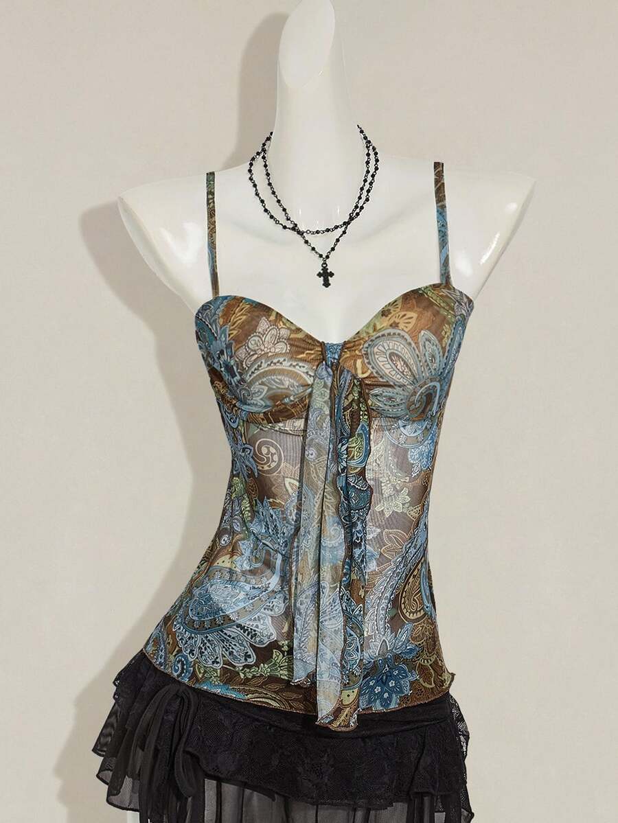 Burgundy paisley print ruched cami top for women featuring thin spaghetti straps, asymmetrical lace-up detail, and a slim fit.