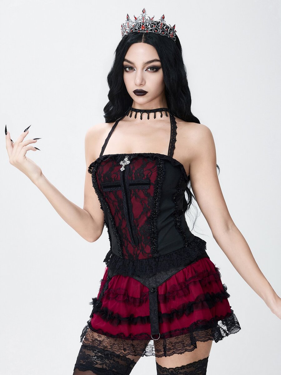 A women's gothic halter cami crop top featuring contrast lace patchwork, velvet fabric, backless knot detail, and slim fit.