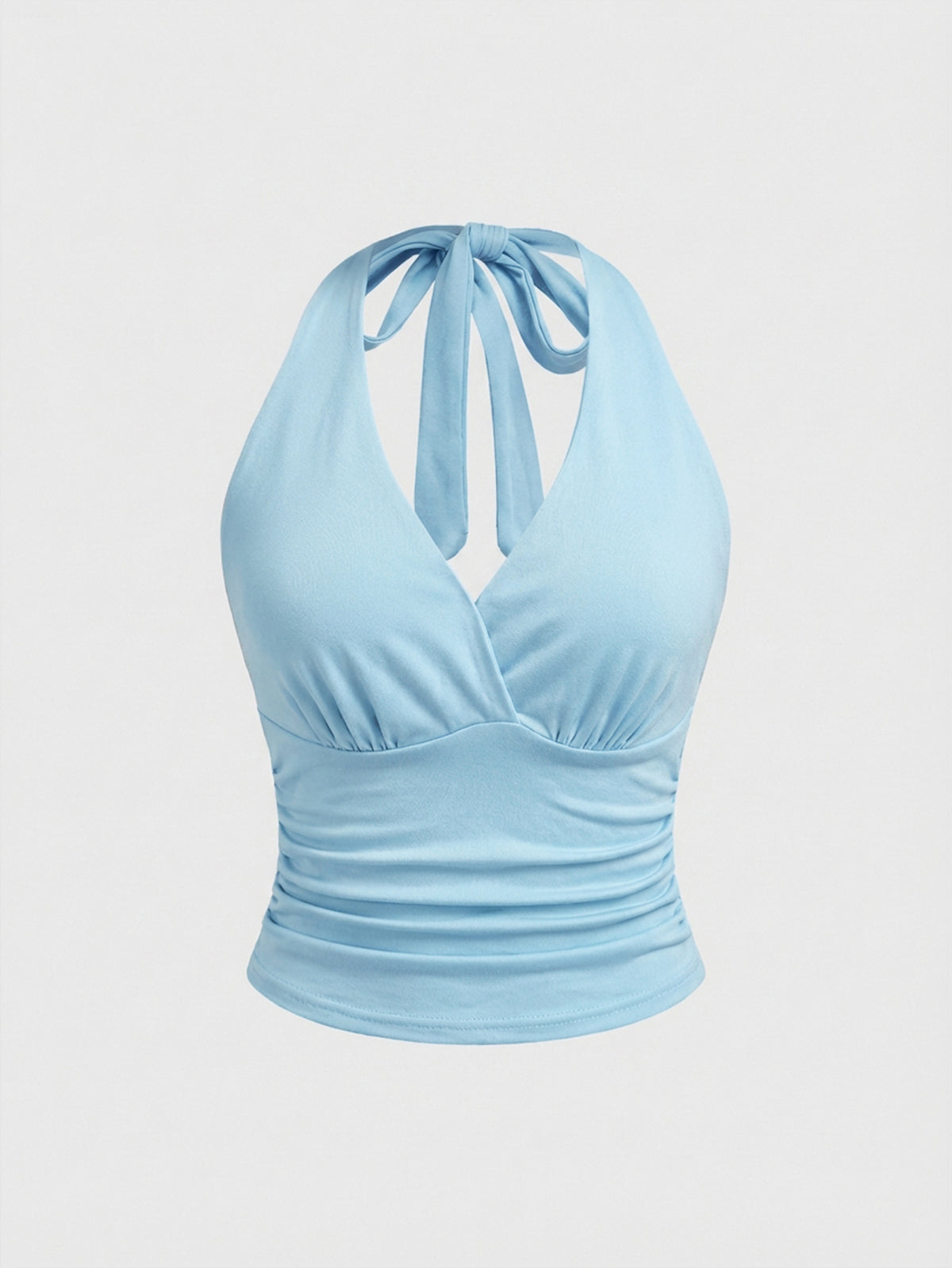 Women's halter crop tank top featuring a backless silhouette and ruched detailing in a slim fit design.