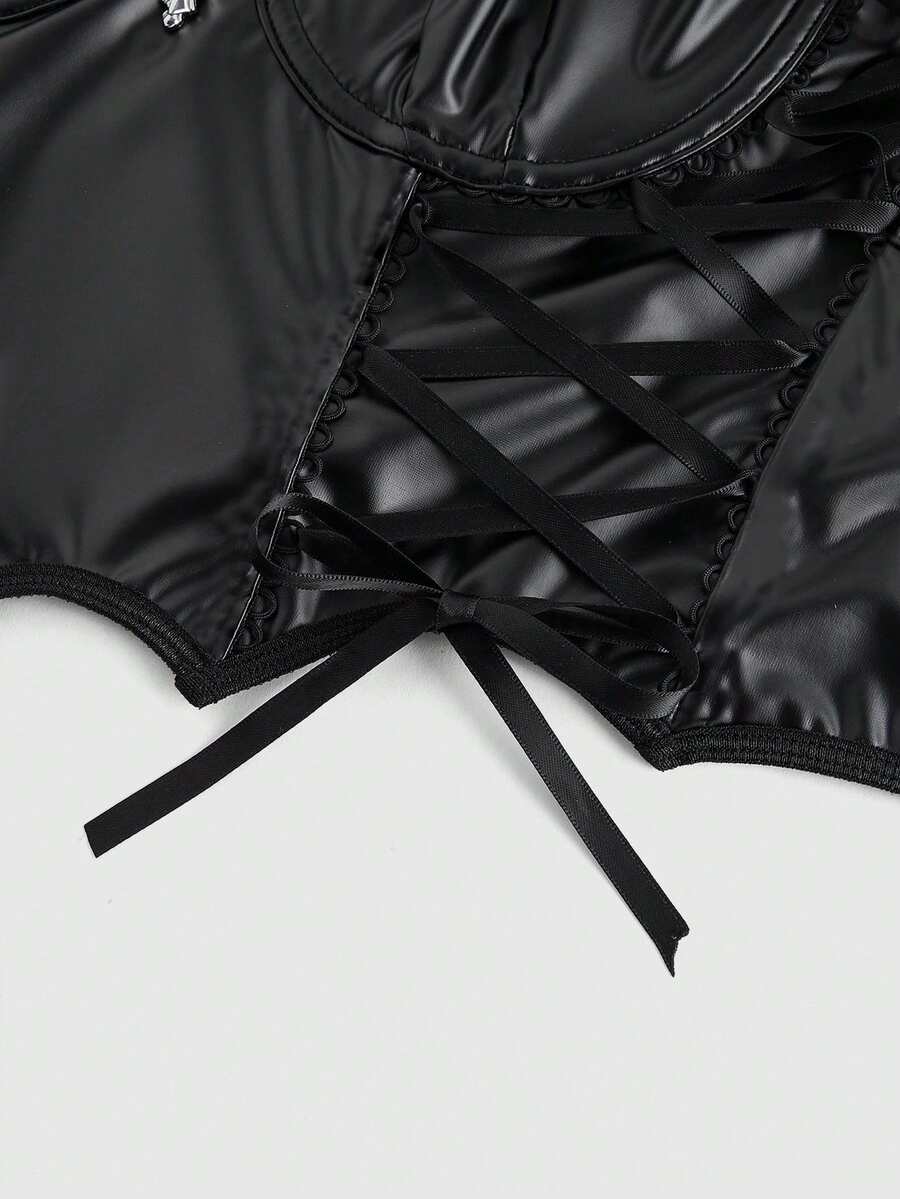 Black goth bat print front-tied camisole for women featuring spaghetti straps, lace-up detail, zipper, cold shoulder accents, and an asymmetrical hem.