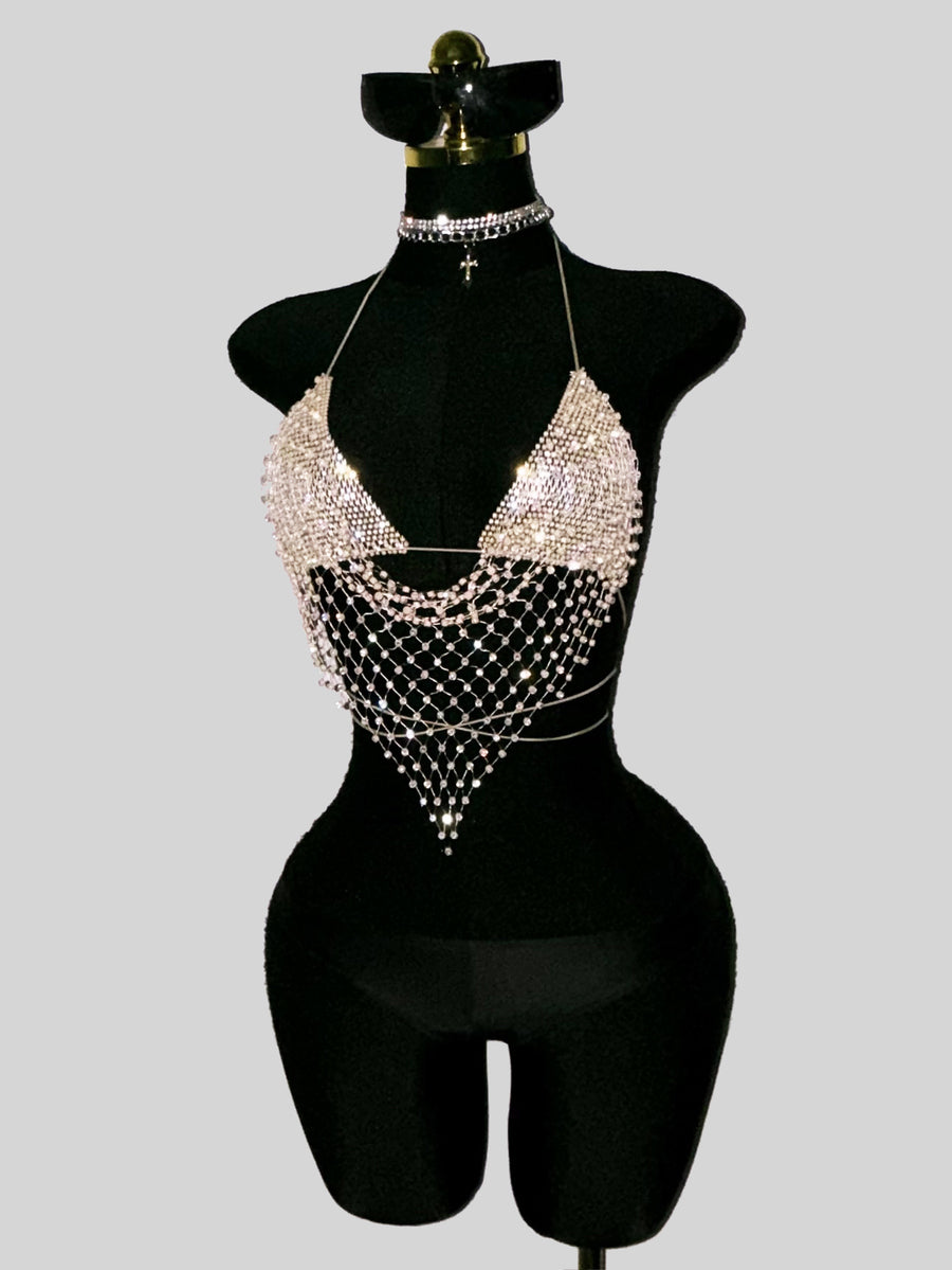 Black sheer mesh halter top for women featuring rhinestone glitter effect, backless design, chain details, and an asymmetrical hem.