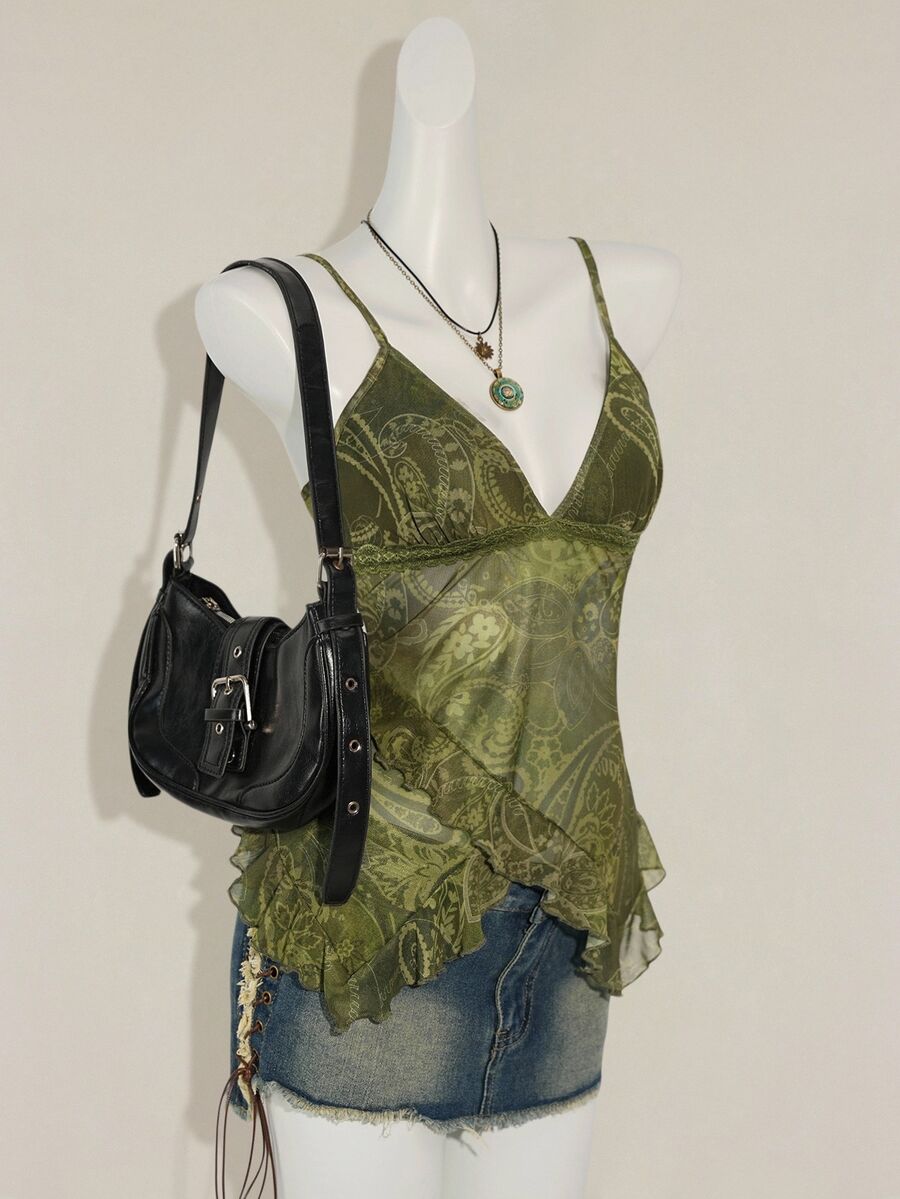 Women's burgundy floral graphic print mesh camisole top featuring an asymmetrical hem, backless cut, and spaghetti straps.