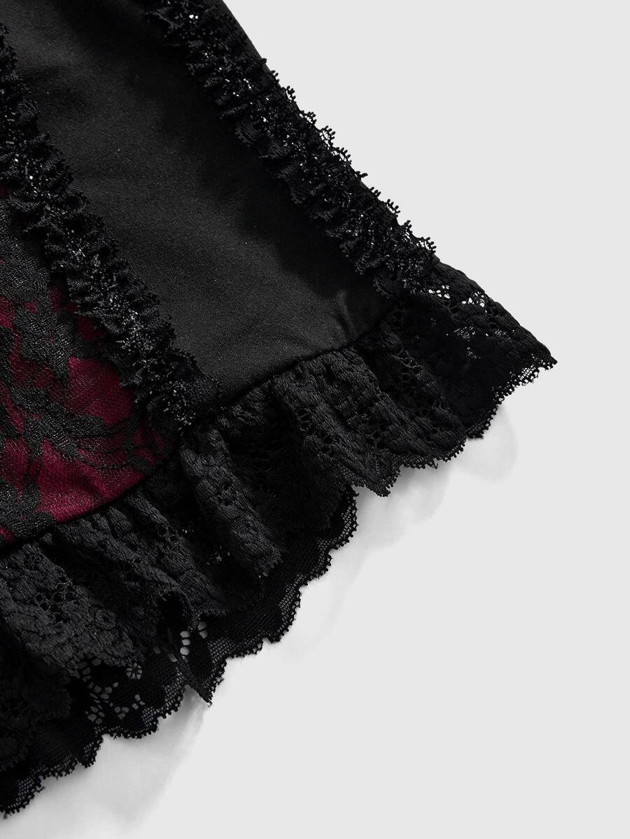 A women's gothic halter cami crop top featuring contrast lace patchwork, velvet fabric, backless knot detail, and slim fit.