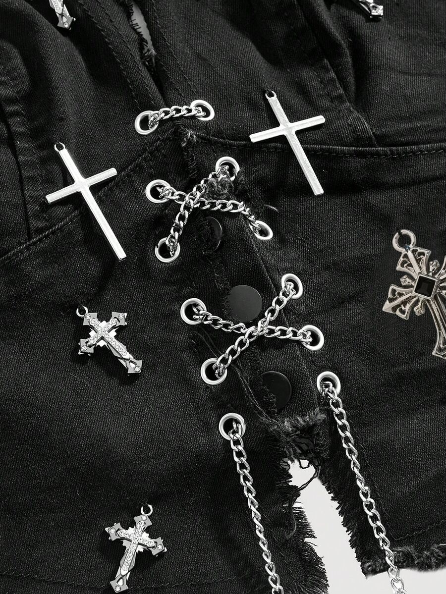 Black goth halter denim crop top featuring a backless cross lace-up design and asymmetrical hem on a model.