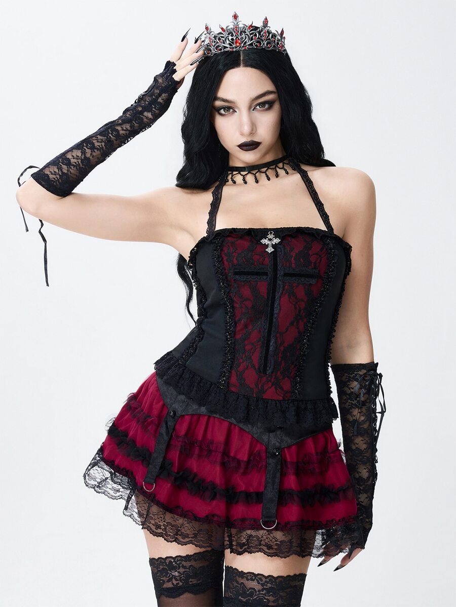 A women's gothic halter cami crop top featuring contrast lace patchwork, velvet fabric, backless knot detail, and slim fit.