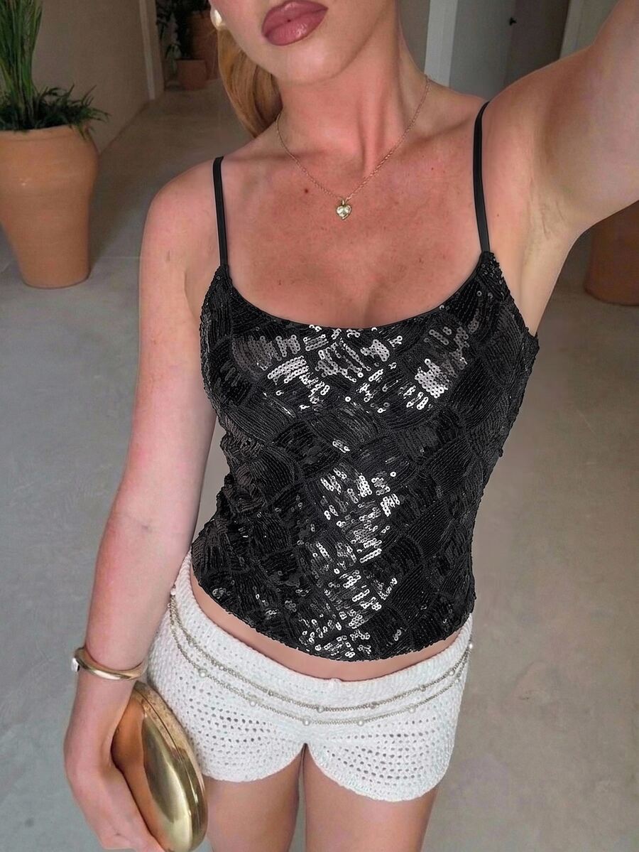 Women's sequin camisole top with spaghetti straps and a 3D rose embellishment