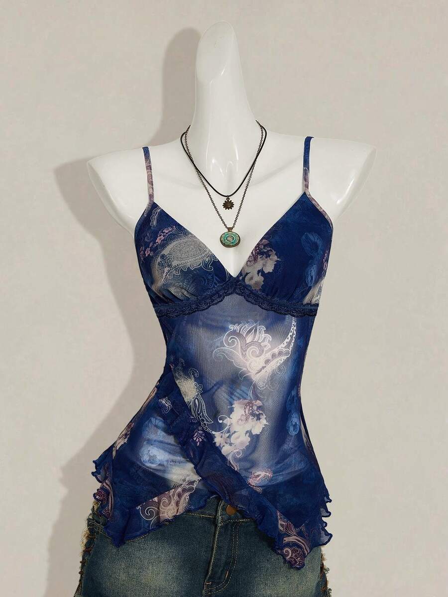 Women's burgundy floral graphic print mesh camisole top featuring an asymmetrical hem, backless cut, and spaghetti straps.